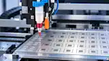 Machine vision inspects flux presence and application consistency after flux jetting.